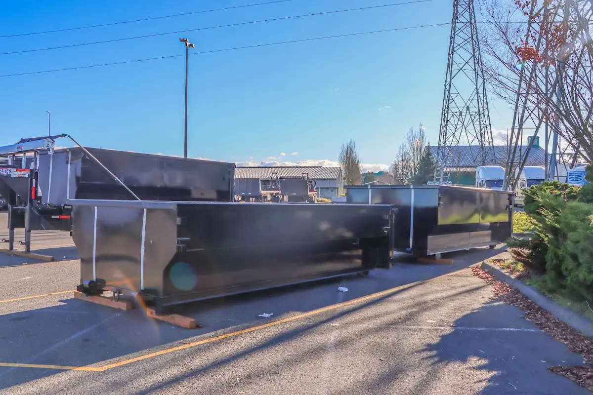Roll-off dumpster ready for waste disposal at job site for 2 Yard Dumpster Rental in Clinton